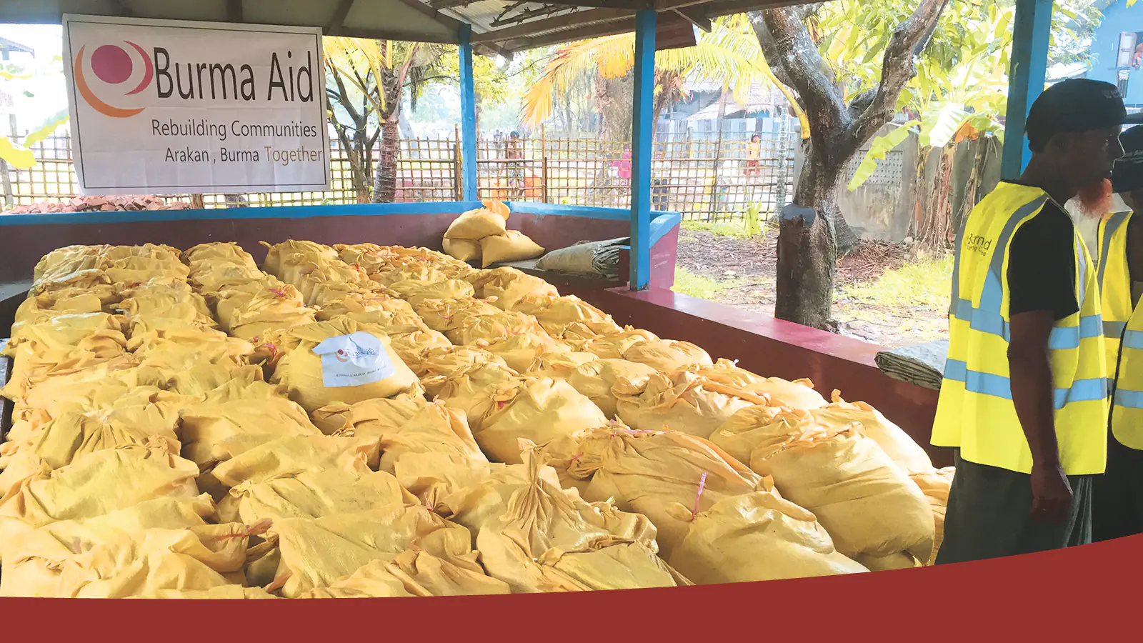 Burma Aid volunteers preparing food-aid packages for distribution